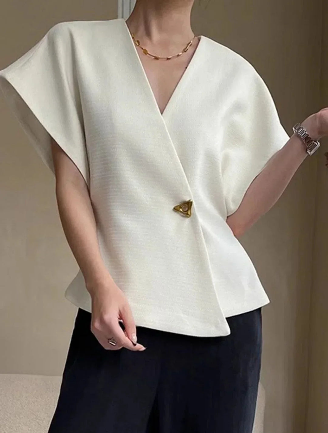 Blouse femme style croisé à manches sculptées