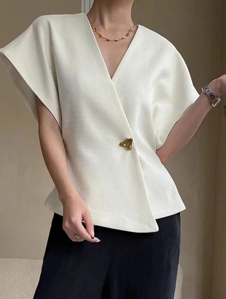 Blouse femme style croisé à manches sculptées