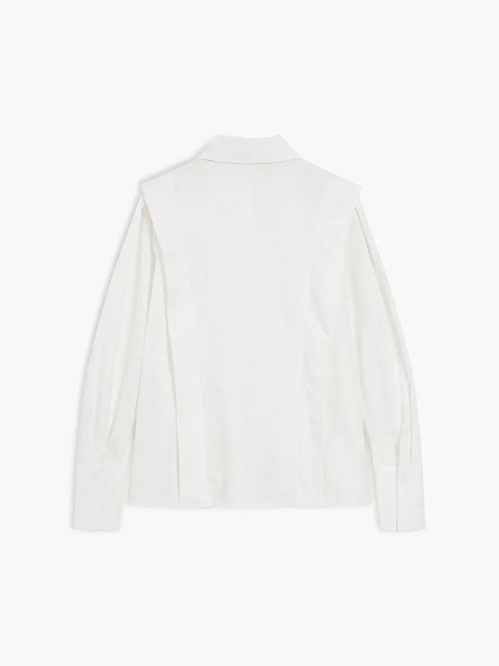 Chemise blanche oversize femme à épaules structurées et col en V