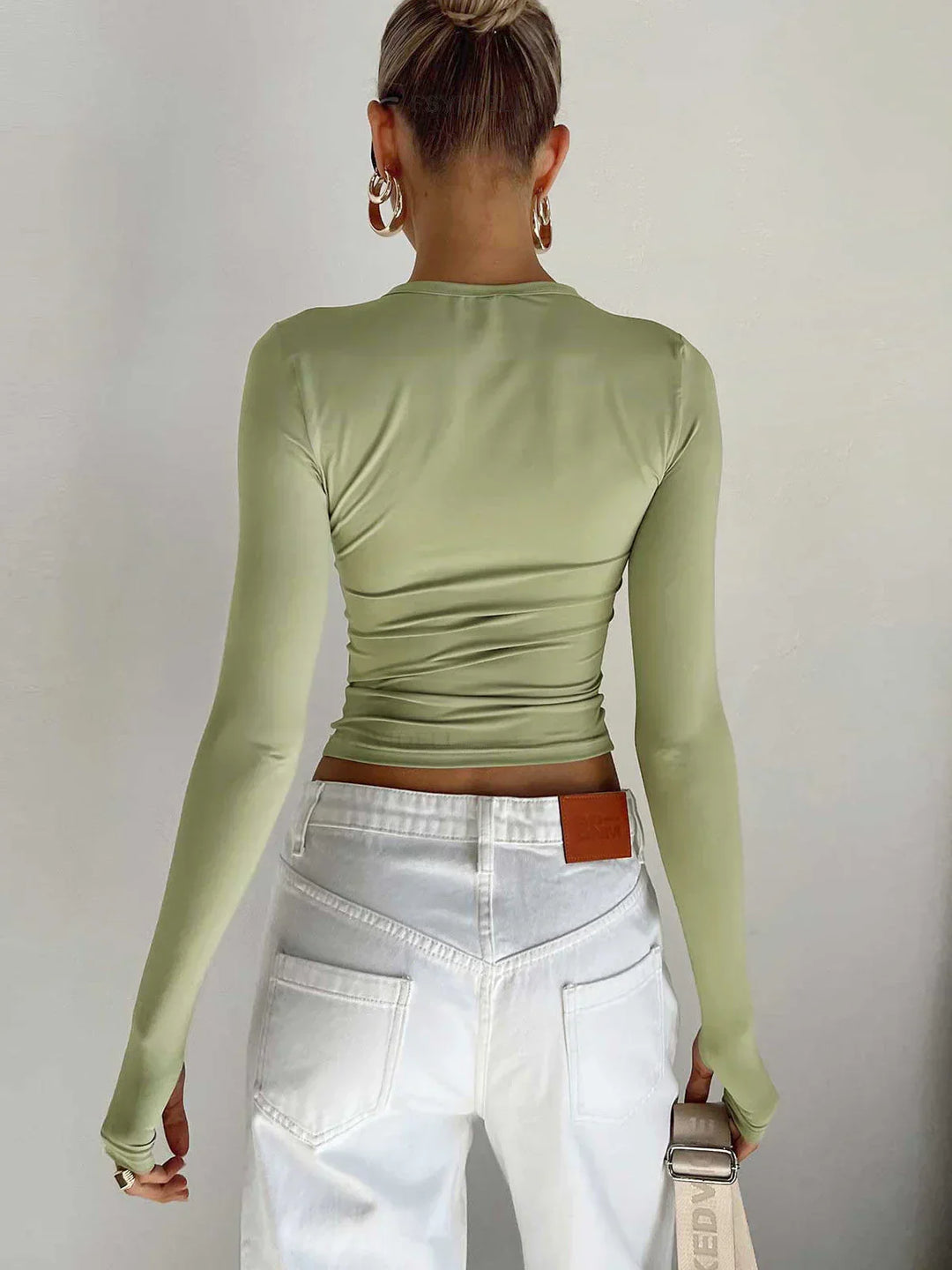 Top femme à manches longues élastique design ajusté
