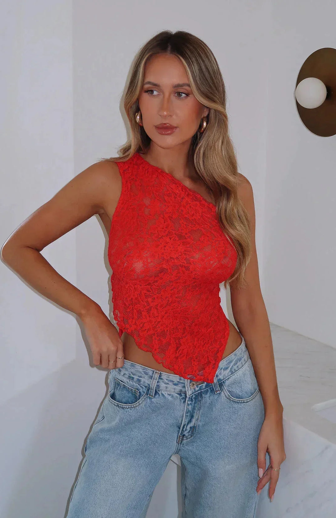 Top asymétrique femme à texture dentelle