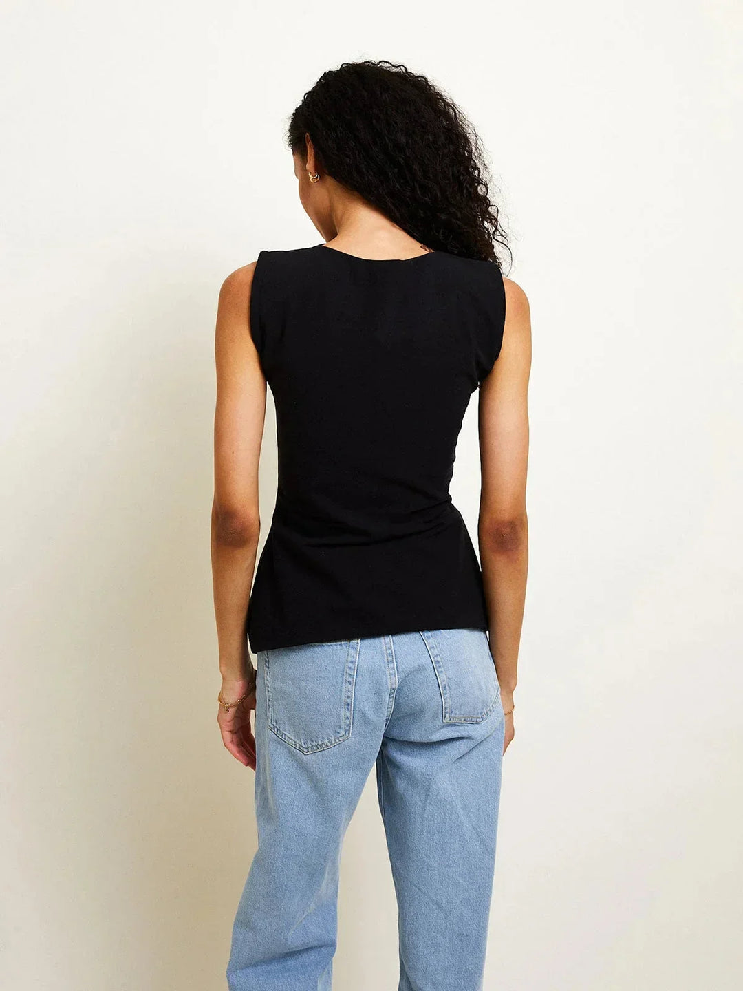 Top femme sans manches avec nœuds ajustables dans le dos